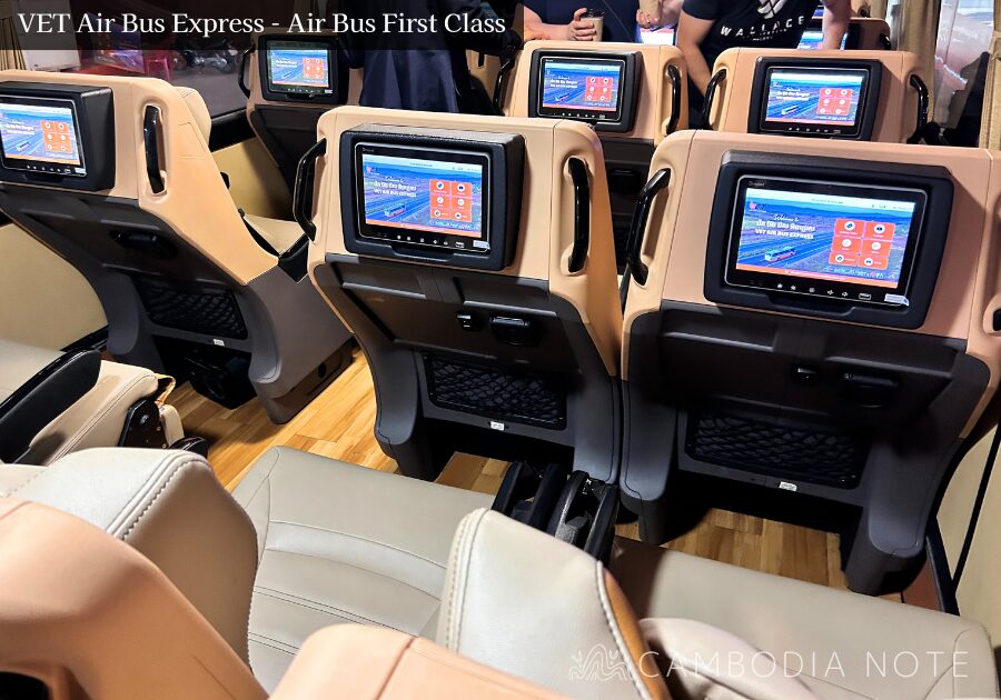 VET Air Bus Express「Air Bus First Class」の車内。広々とした3列シートとレッグレスト付き座席が並ぶ快適な空間